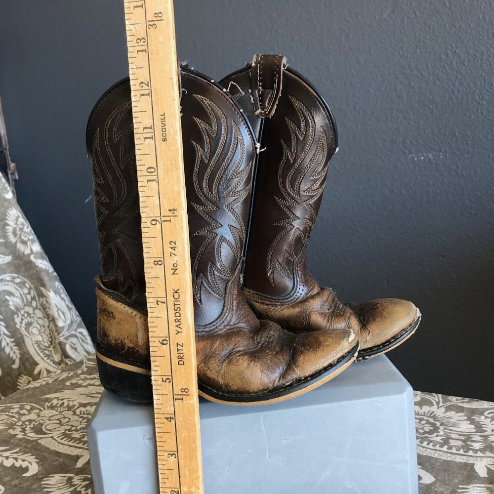 Worn little kid Cowboy Boots